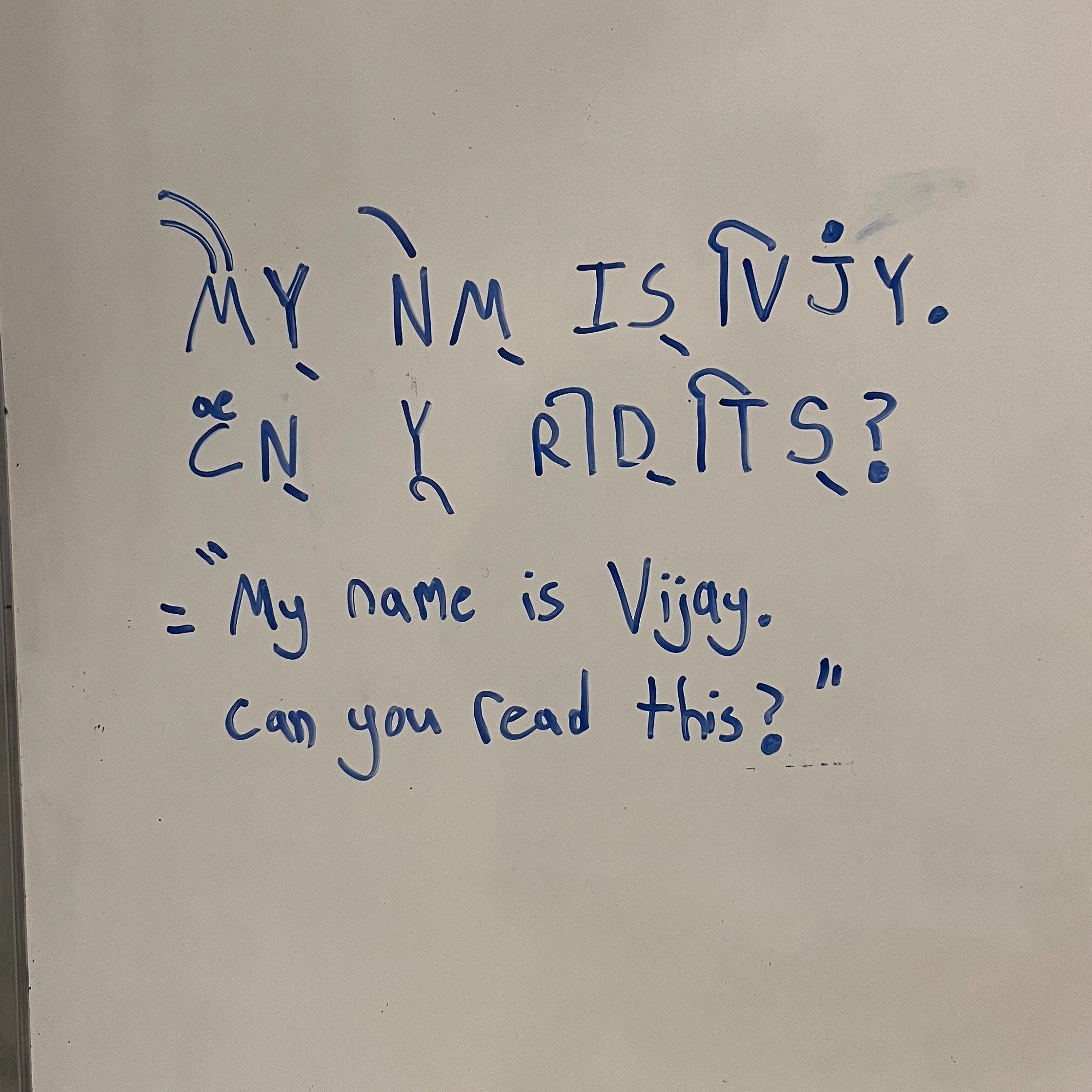 A writing system combining English consonants with Hindi vowels